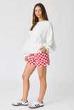 Orange checkerboard shorts