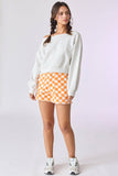 Orange checkerboard shorts
